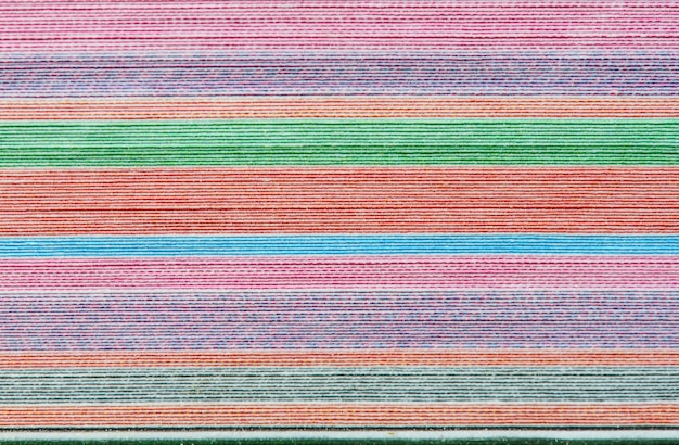 colorful background with soft faded rainbow-colored horizontal stripes