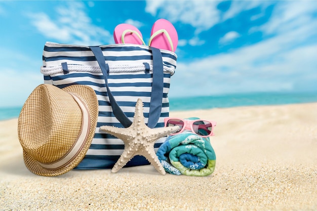 Colorful Bag on Summer Beach, travel concept