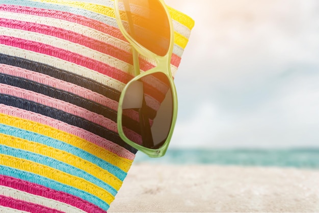 Colorful Bag and Sunglasses on Summer Beach