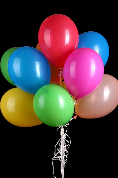 Colorful balloons isolated on black