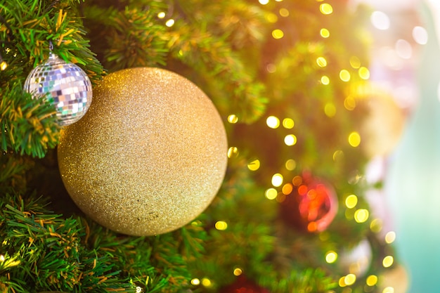 Colorful balls on green Christmas tree