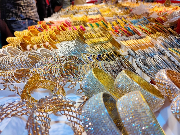 Colorful bangles from a shop in Bangladesh Background of colorful bangles stacked with glitter