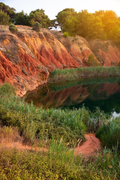 Colorful bauxite quarry lake in Apulia Italy