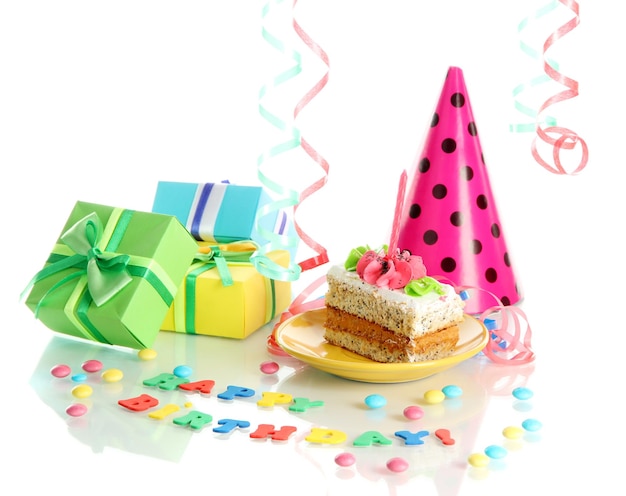 Colorful birthday cake with candle and gifts isolated on white