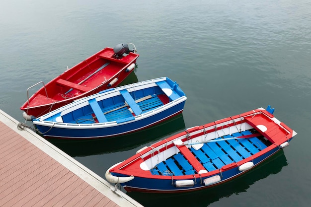 Colorful boats moored in fishing port