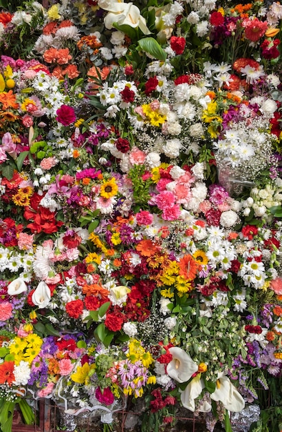 Colorful bouquet in red pink yellow white and green close up Various types of cut flowers