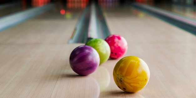 Colorful bowling balls on the alley