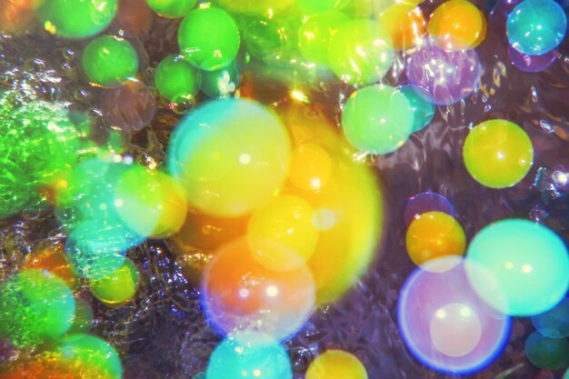 Photo colorful bubbles background abstract colorful bokeh effect