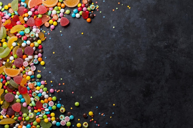 Colorful candies jelly and marmalade over stone