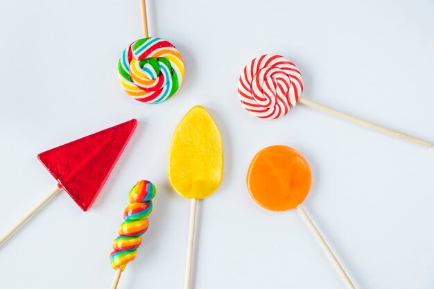 Colorful candies, lollypop on the white background, multicolored