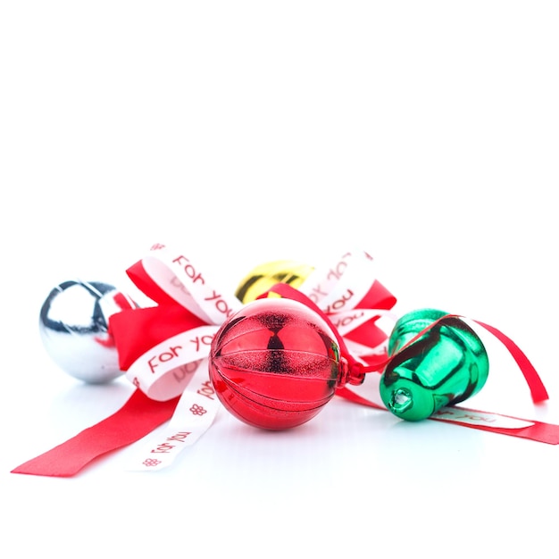 Colorful christmas ball decoration on white with space for text