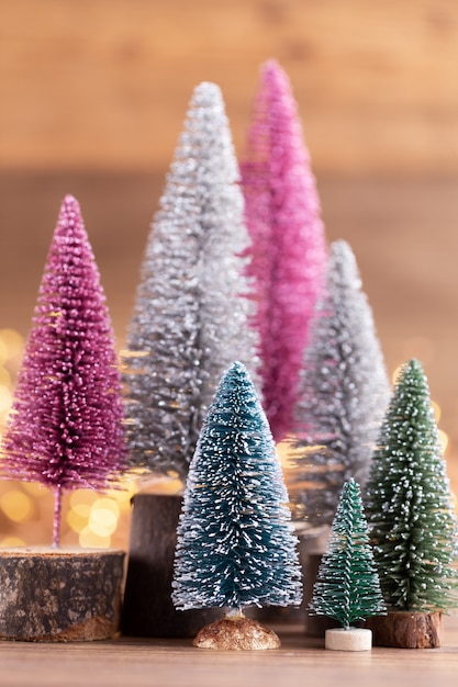 Colorful Christmas tree on bokeh background. Christmas holiday celebration concept. Greeting card.