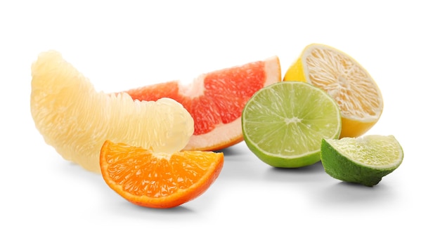 Colorful citrus slices and halves isolated on a white background close up