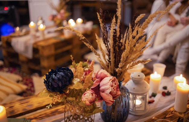 A colorful closeup of dried flowers dried oranges fragrant herb leaves and seedpods used as flower c