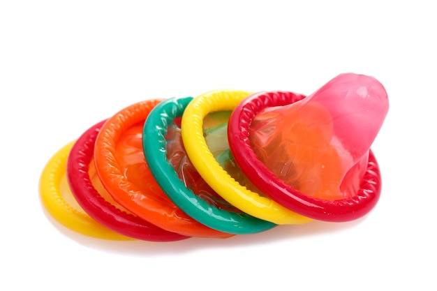 Colorful condoms isolated on white