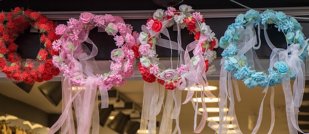 Colorful crowns made of fake flowers