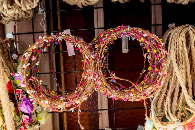 Colorful crowns for sale made of fake flowers