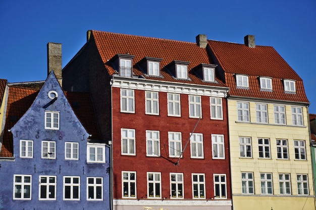 Colorful Danish houses near famous Nyhavn canal in Copenhagen, Denmark