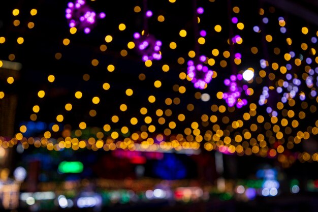 Colorful Defocus Abstract bokeh light effects on the street night black background texture wallpaper