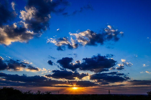 Colorful dramatic sky with cloud at sunset