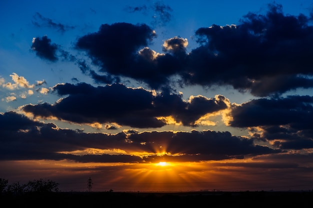 Colorful dramatic sky with cloud at sunset