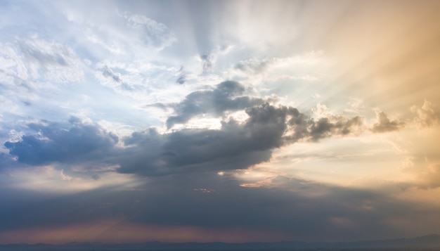 colorful dramatic sky with cloud at sunset.