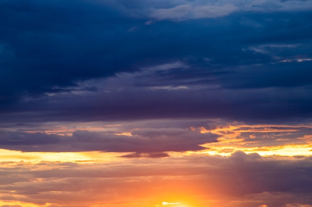 Colorful dramatic sky with cloud at sunset