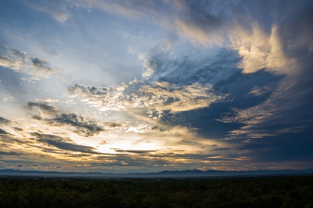 Colorful dramatic sky with cloud at sunset.