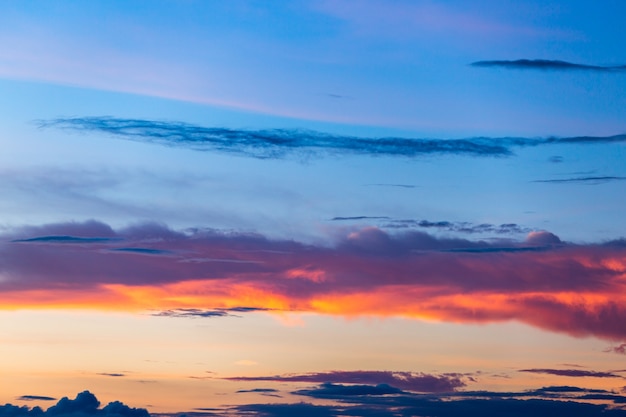 Colorful dramatic sky with cloud at sunset.