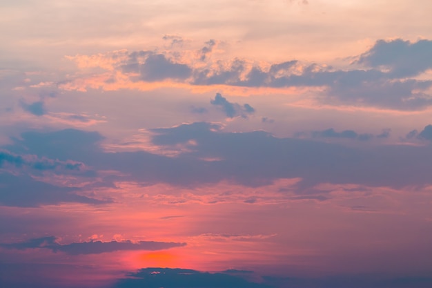 Colorful dramatic sky with cloud at sunset.