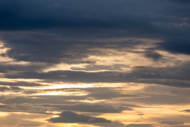 Colorful dramatic sky with cloud at sunset.