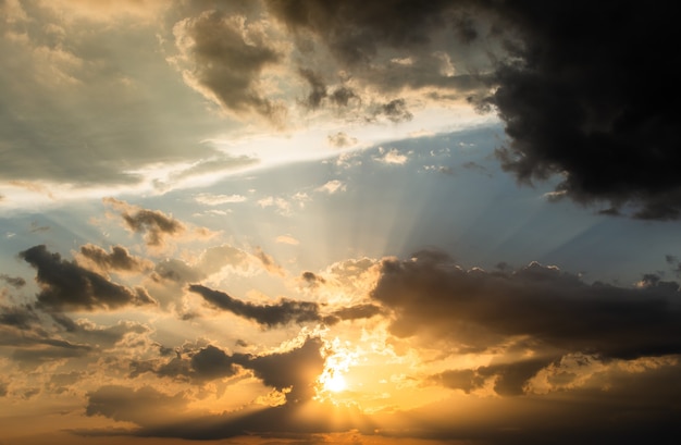 Colorful dramatic sky with cloud at sunset.