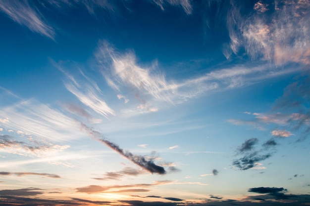 Colorful dramatic sky with cloud at sunset.