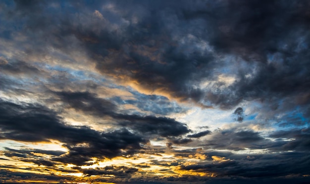 Colorful dramatic sky with cloud at sunset