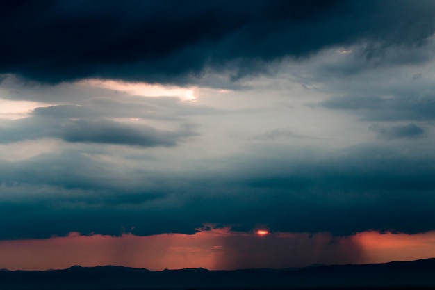 Colorful dramatic sky with cloud at sunset