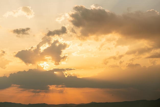 Colorful dramatic sky with cloud at sunset