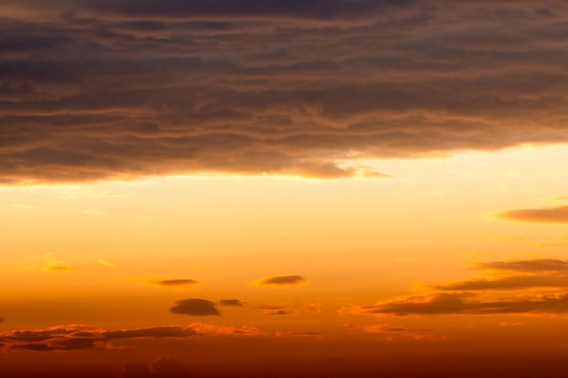 Colorful dramatic sky with cloud at sunset