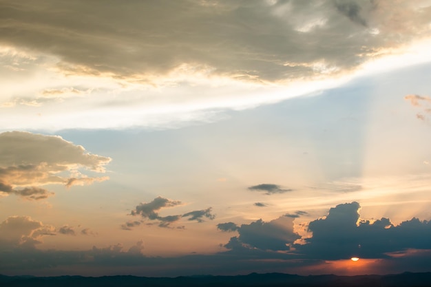 Colorful dramatic sky with cloud at sunset