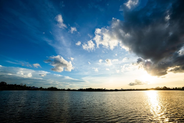 Colorful dramatic sky with cloud at sunset