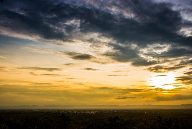 Colorful dramatic sky with cloud at sunset