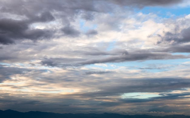 Colorful dramatic sky with cloud at sunsetxA