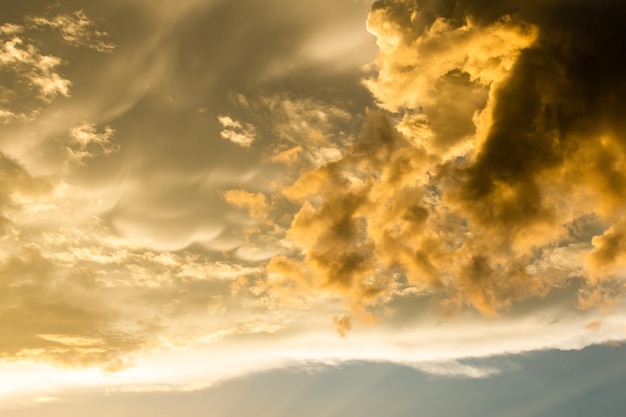 Colorful dramatic sky with cloud at sunsetxA