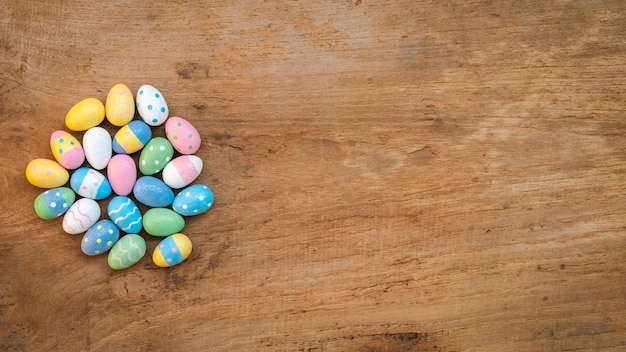 Colorful Easter Egg on a rustic old wood background Above view with copy space