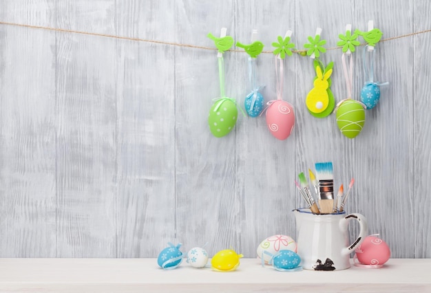 Colorful easter eggs and brushes