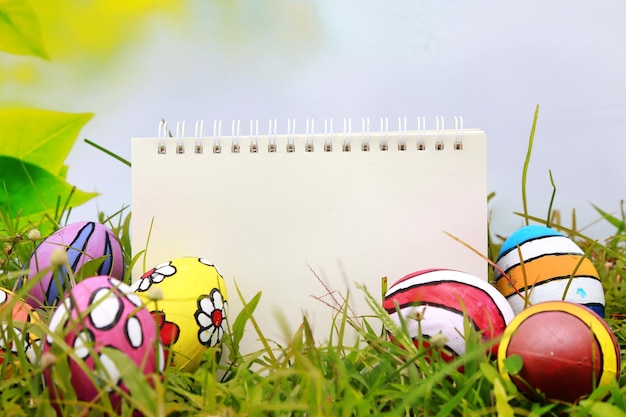 colorful Easter Eggs celebration Spring event background with blank notebook template