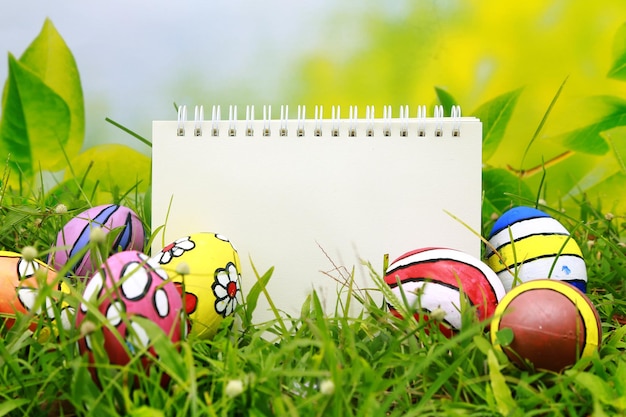 colorful Easter Eggs celebration Spring event background with blank notebook template