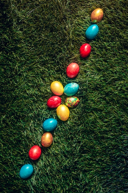 Colorful Easter eggs on the grass