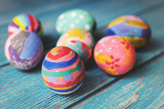 Colorful Easter eggs on table. Easter festive holidays concept.