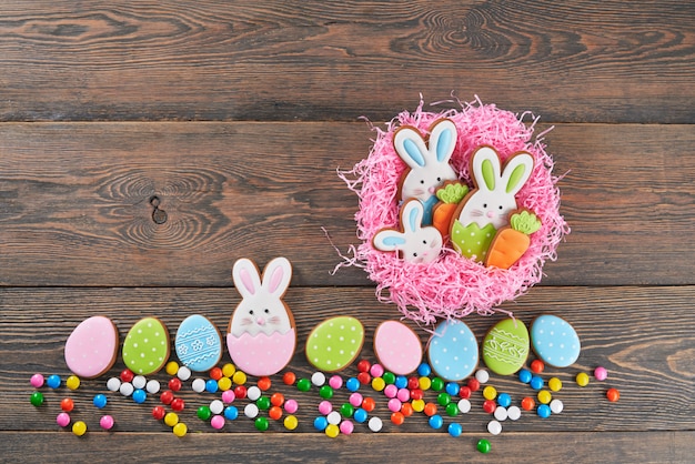 Colorful easter ginger cookies in nest.