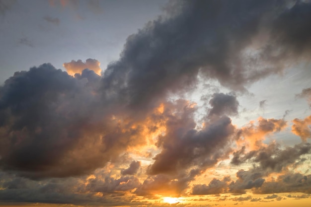 Colorful evening landscape with soft pastel coloured clouds on watercolor tinted sunset sky Abstract nature background